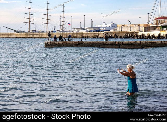 RUSSIA, SOCHI - DECEMBER 3, 2023: A woman is seen in the Black Sea off the Mayk beach. According to the website of the Sochi administration