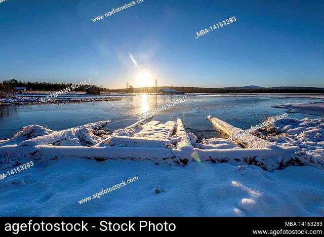 fishing huts at the inlet to torasjärvi, behind the mountain olos, toras-sieppi, muonio, lapland, finland