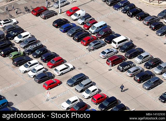 parking lot with cars at the neuer markt, stralsund, mecklenburg-western pomerania, germany, europe