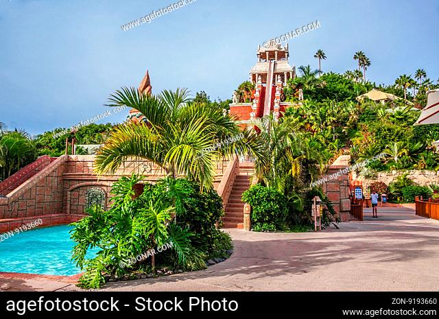 Slide with palms and trees of auqa park in Tenerife, Spain