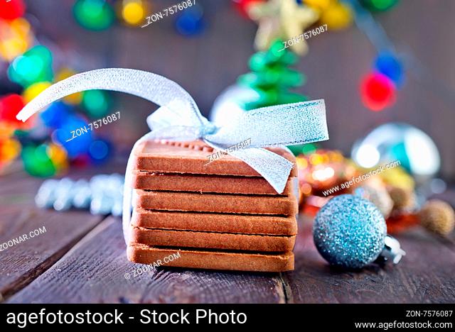 christmas cookies and decoration on the wooden table