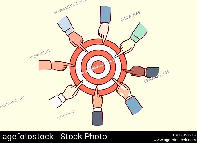 Hands of diverse people near target for concept of collaboration for solving joint task and teamwork in business. Achieving set goals to gain strategic...