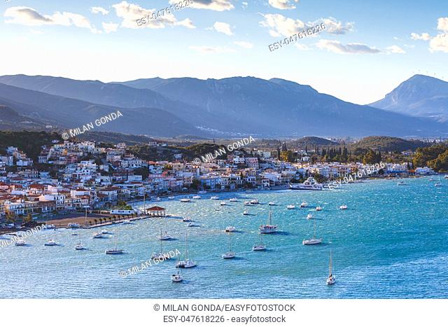 View of Galatas village in Peloponnese peninsula from Poros island, Greece.