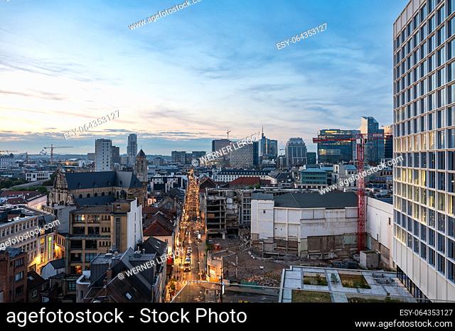 Brussels city center, Belgium, July 20 , 2023 - Panoramic view during sunset over the north of the city with a major construction site