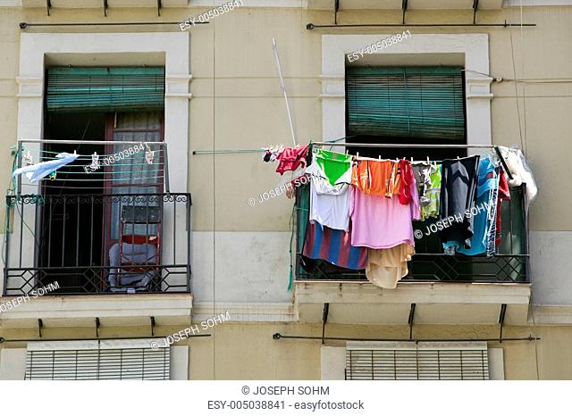 Laundry hangs in window of old section of Barcelona, Spain