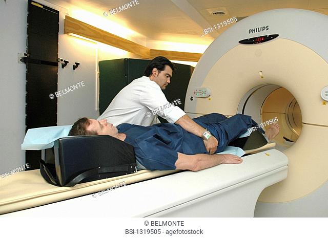 PETSCAN<BR>Photo essay from hospital.<BR>Nuclear medicine unit at the Hôpital Saint Louis in Paris. Positioning the patient in preparation for a PET scan