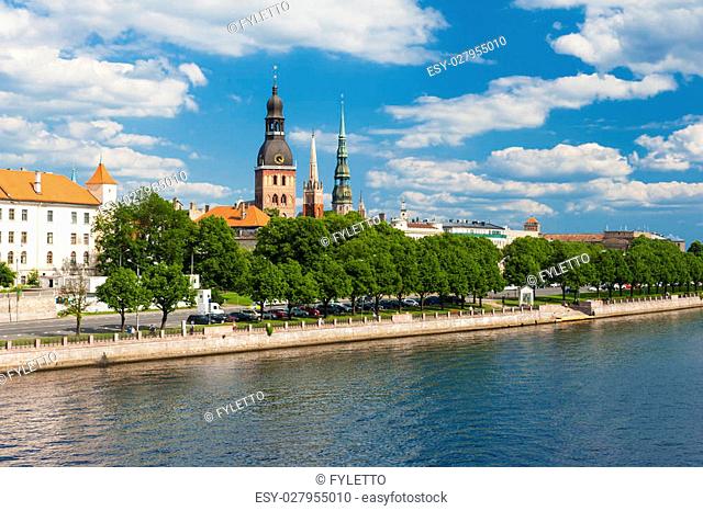 Towers of Riga and castle seen across river Daugava. Three church towers in the picture are the Riga Dome cathedral, St. Saviour's Church and St