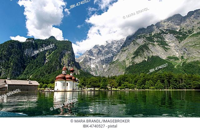 Water reflection, lake Königssee with Watzmann Massif and pilgrimage church of St. Bartholomew, National Park Berchtesgaden, Berchtesgadener, Upper Bavaria