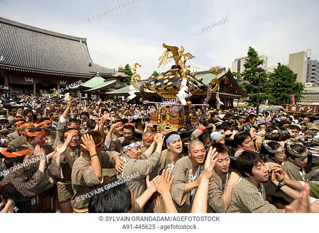 Yearly matsuri (festival) of Kannon Temple in Asakusa featuring a procession of 200 'Mikoshi'  (mobile shrines).Tokyo. Japan
