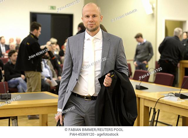 Clemens Eimterbaeumer, a prosecutor in the trial against former German President Wulff (not pictured) arrives in the courtroom at the regional court in Hanover