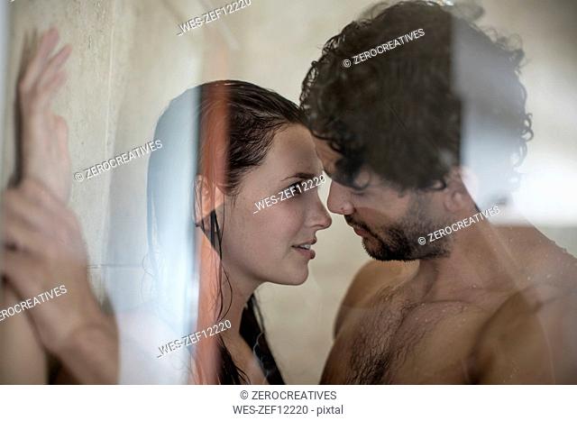 Intimate young couple in shower