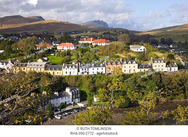 Houses on hillside overlooking the harbour, the Storr visible on horizon, Portree, Isle of Skye, Highland, Scotland, United Kingdom, Europe