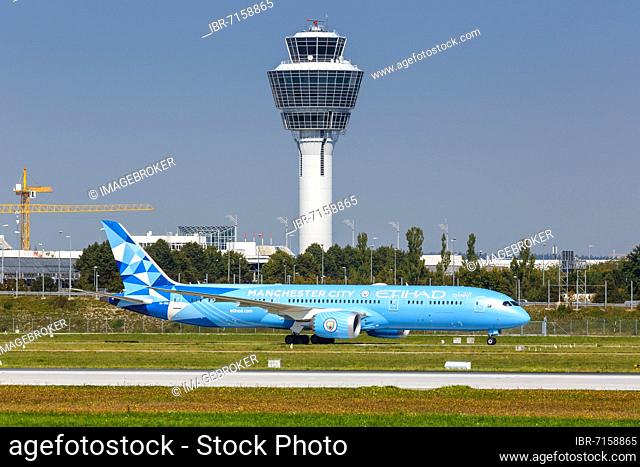 An Etihad Boeing 787-9 Dreamliner aircraft with registration A6-BND and Manchester City special livery at Munich Airport, Germany, Europe