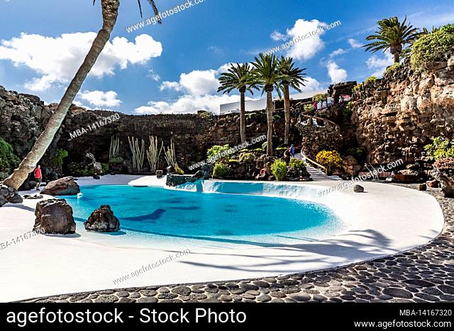 tropical garden with swimming pool, jameos del agua, art and cultural site, built by césar manrique, spanish artist from lanzarote, 1919-1992, lanzarote