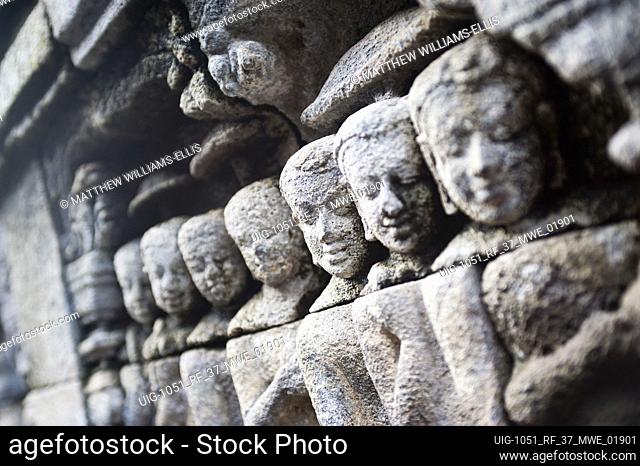 Close Up Photo of Bas Relief Carvings that Line the Walls of Borobudur Temple, Yogyakarta, Java, Indonesia. Borobudur is a Buddhist Temple in just outside...