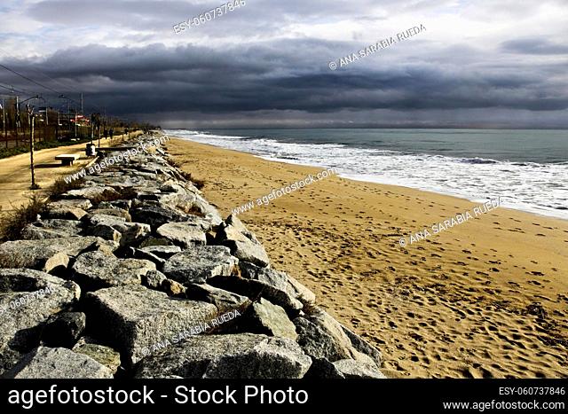 View of contention rocks next to the beach in El Masnou, Spain