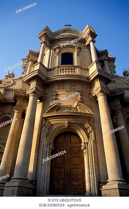 Church and Convent of San Domenico. Baroque golden sandstone facade with angled view of doorway