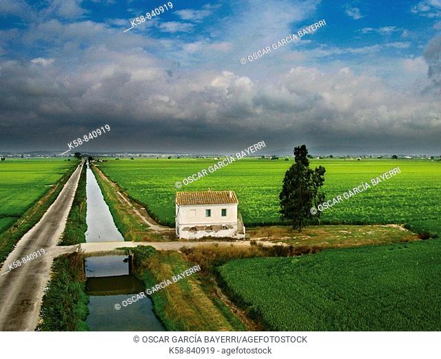 Aerial view of rice paddies and Cottage in the Ebro Delta, Catalonia, Spain