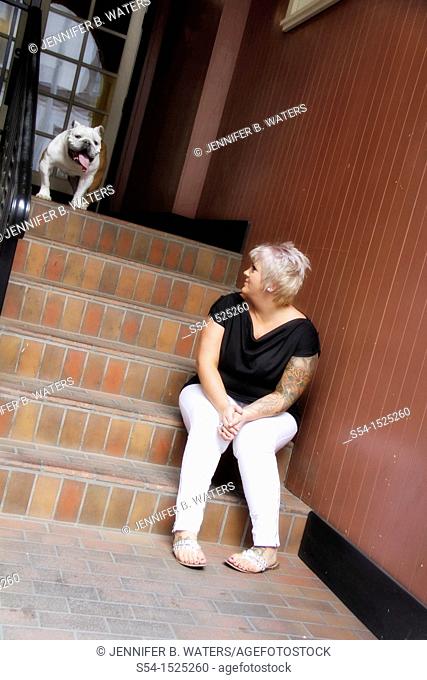 A caucasian woman with her English Bulldog in Spokane, Washington, USA