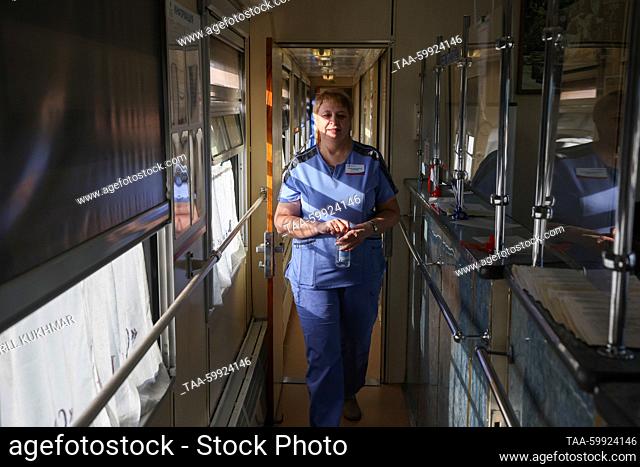 RUSSIA, KRASNOYARSK REGION - JUNE 19, 2023: A medical worker is seen in a railway car of the Doctor Voino-Yasenetsky-St Luke mobile diagnostic center in the...