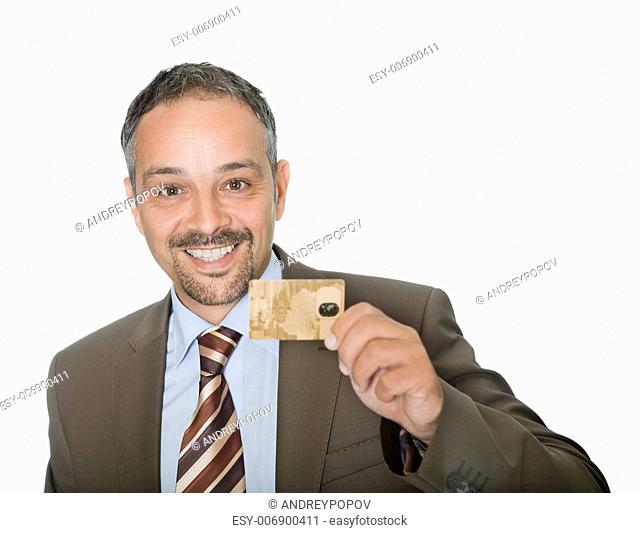 Happy businessman holding a credit crad