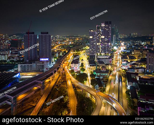 Bukit Bintang, Kuala Lumpur, Malaysia - Nov 28 2022: The city's roads and highways are brightly lit up, creating a mesmerizing pattern of light trails that...