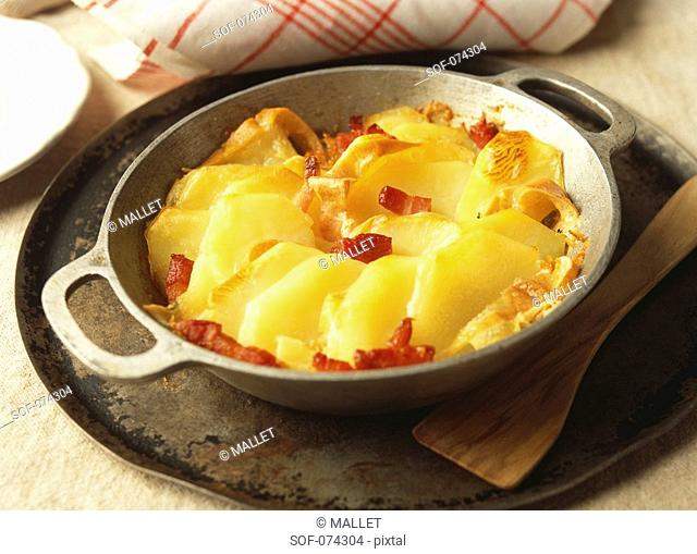 Potatoes with roblochon cheese au gratin