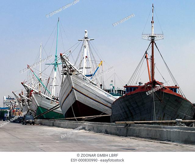 Old transport ships in Jakarta harbor Indonesia