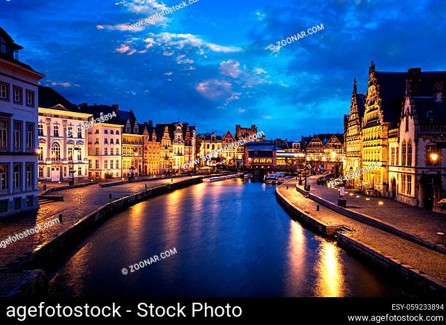 Ghent canal, Graslei and Korenlei streets in the evening. Ghent, Belgium