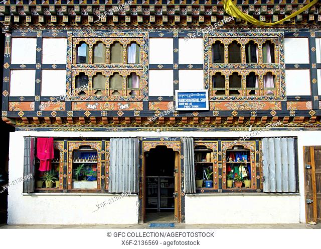 Shopping street with boutiques in typical Bhutanese buildings, Paro, Bhutan