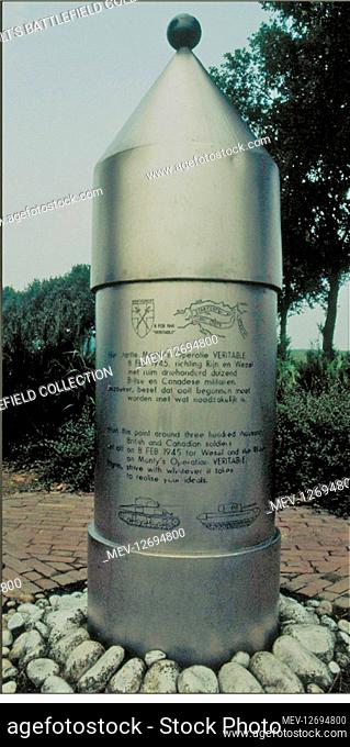 Shaped like an airborne canister, or the Tinman in the Wizard of Oz film, this metal Memorial records on the back that on 17/18 September 1944