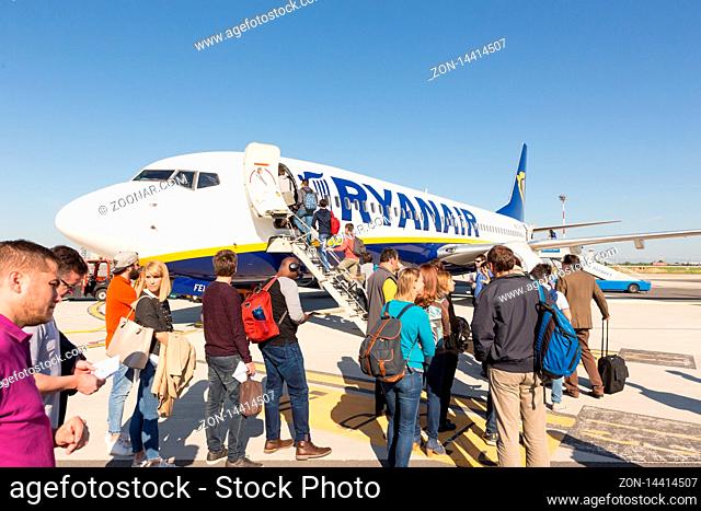 Trieste airport, Italy - 20 April 2018: People boarding Ryanair plane on Friuli Venezia Giulia Airport in Trieste, italy on April 20th, 2018