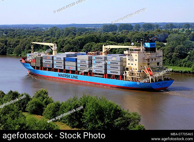 Cargo ship on the Kiel Canal at Schafstedt, Schleswig-Holstein, Germany