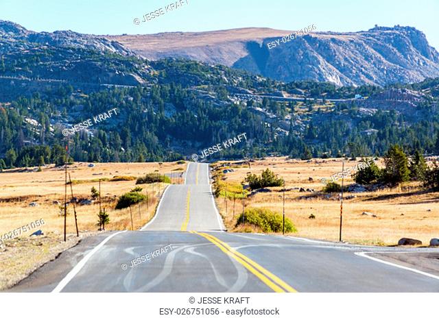 Highway leading to wilderness in the Shoshone National Forest and the Beartooth Mountains in Wyoming