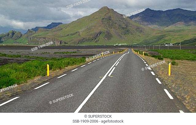 Icelandic road between Seljalandsfoss and Reykjavik in summer day daytime Iceland Europe