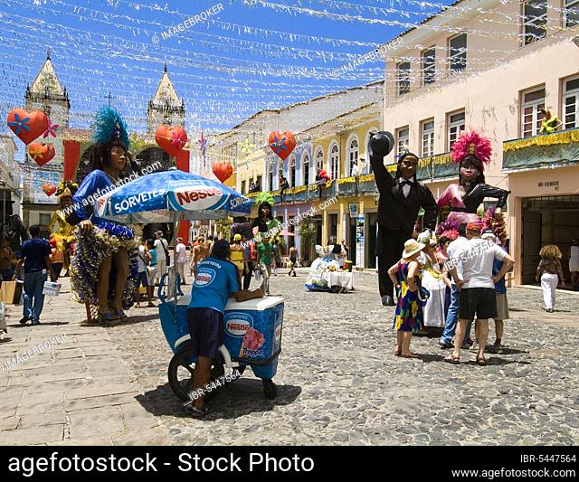 Figures in carnival costumes, Largo Cruzeiro Sao Francisco, historic centre of Salvador de Bahia, Brazil, South America