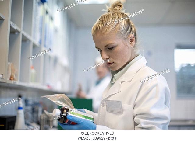 Young woman working in medicinal lab