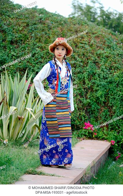 FloArt - Bhutia men wear Jya Jya, a waistcoat, the shirt called Yenthatse,  Kera, a cloth-belt and Shambo, the cap. They pair the entire outfit with  loose trousers. The bhutia tribe is