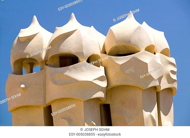 Sculptural chimneys on roof of Casa Mila, La Pedrera, by Antoni Gaudi, built between 1905-1911, Barcelona, Spain