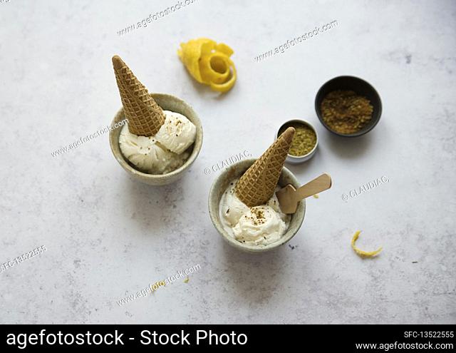 Lemon ice cream served with ice cream cones in small bowls