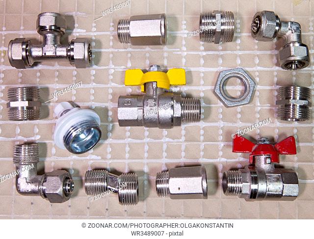 elements of water and gas shutoff valves, flat lay