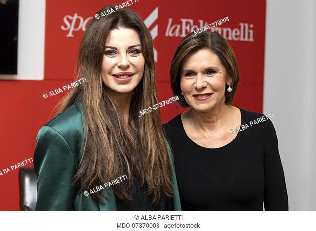 Italian journalist and TV presenter Bianca Berlinguer and Alba Parietti present the book Storia Di Marcella Che Fu Marcello at the Feltrinelli bookshop in...