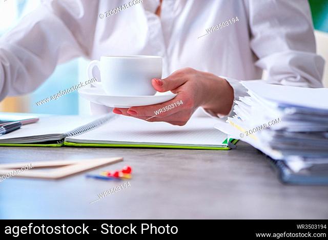 Woman hands working on computer at desk