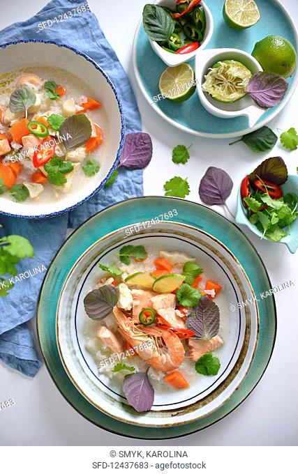 Thai style fish soup with prawns and salmon