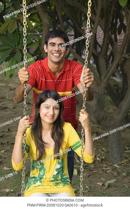 Couple on a swing, New Delhi, India