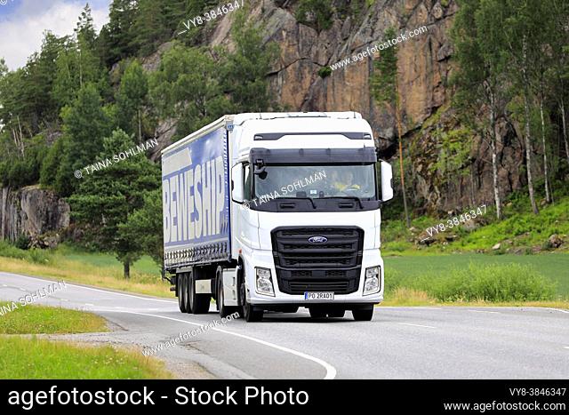 Ford F-MAX, heavy truck by Ford Otosan, International Truck of the Year 2019, PL plates, pulls semi trailer on Road 52, Salo, Finland. July 9, 2021