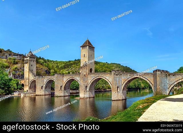 Pont Valentre is a 14th-century six-span fortified stone arch bridge crossing the Lot River in Cahors, France