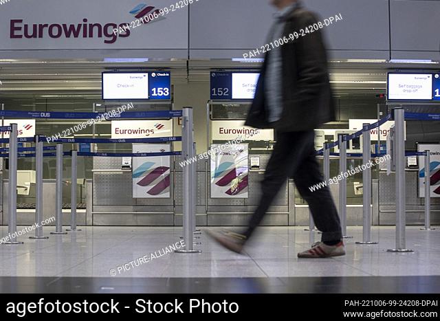06 October 2022, North Rhine-Westphalia, Duesseldorf: Empty check-in counters at Düsseldorf Airport. Eurowings pilots go on all-day strike