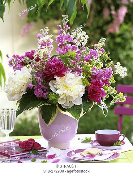 Arrangement of peonies, stocks and lady's mantle