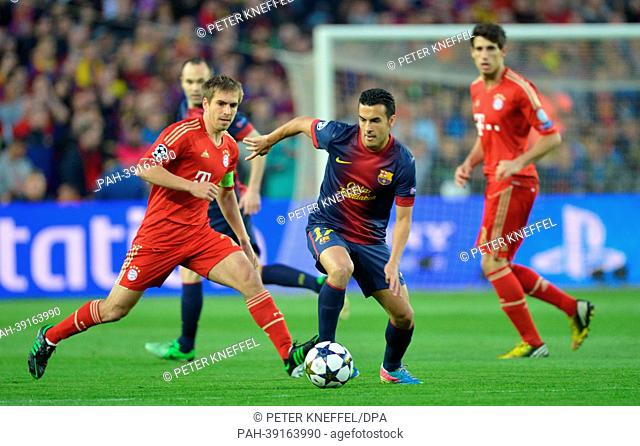Barcelona's Pedro Rodriguez (C) and Munich's Philipp Lahm (L) vie for the ball during the UEFA Champions League semi final second leg soccer match between FC...